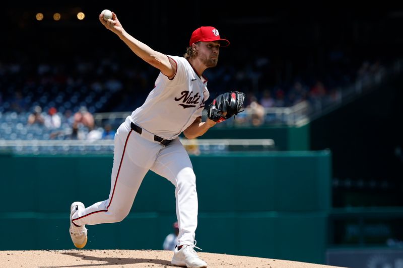 May 22, 2024; Washington, District of Columbia, USA; Washington Nationals pitcher Jake Irvin (27) pitches against the Minnesota Twins during the first inning at Nationals Park. Mandatory Credit: Geoff Burke-USA TODAY Sports