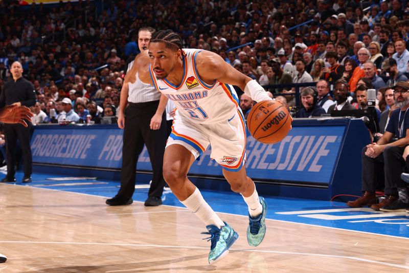 OKLAHOMA CITY, OK - FEBRUARY 22:  Aaron Wiggins #21 of the Oklahoma City Thunder handles the ball during the game against the LA Clippers on February 22SF, 2024 at Paycom Arena in Oklahoma City, Oklahoma. NOTE TO USER: User expressly acknowledges and agrees that, by downloading and or using this photograph, User is consenting to the terms and conditions of the Getty Images License Agreement. Mandatory Copyright Notice: Copyright 2024 NBAE (Photo by Zach Beeker/NBAE via Getty Images)