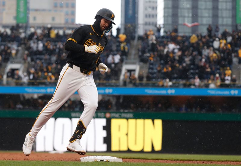 Apr 5, 2024; Pittsburgh, Pennsylvania, USA;  Pittsburgh Pirates second base Jared Triolo (19) circles the bases on a solo home run against the Baltimore Orioles during the seventh inning at PNC Park. The Orioles won 5-2. Mandatory Credit: Charles LeClaire-USA TODAY Sports