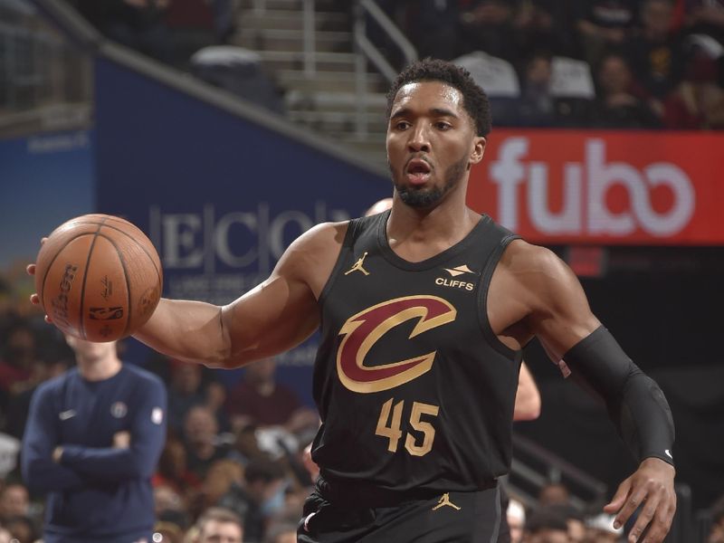 CLEVELAND, OH - NOVEMBER 03:Donovan Mitchell #45 of the Cleveland Cavaliers handles the ball during the game against the Washington Wizards during the Emirates NBA Cup game on November 03, 2024 at Rocket Mortgage FieldHouse in Cleveland, Ohio. NOTE TO USER: User expressly acknowledges and agrees that, by downloading and/or using this Photograph, user is consenting to the terms and conditions of the Getty Images License Agreement. Mandatory Copyright Notice: Copyright 2024 NBAE (Photo by David Liam Kyle/NBAE via Getty Images)