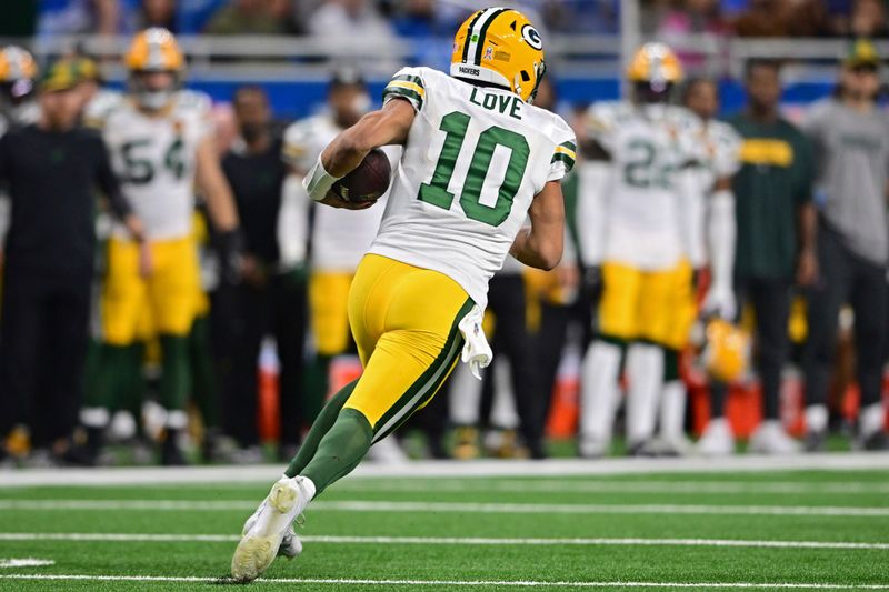 Green Bay Packers quarterback Jordan Love runs the ball during the second half of an NFL football game against the Detroit Lions, Thursday, Nov. 23, 2023, in Detroit. The Packers won 29-22. (AP Photo/David Dermer)