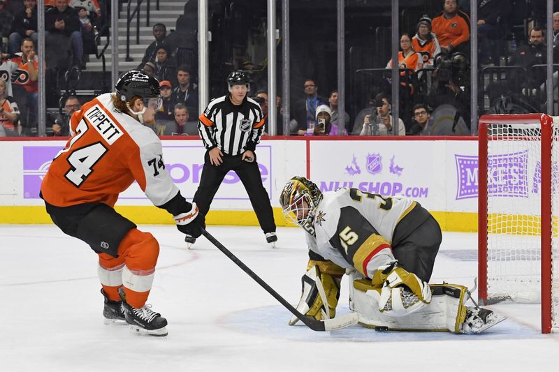 Nov 25, 2024; Philadelphia, Pennsylvania, USA; Vegas Golden Knights goaltender Ilya Samsonov (35) makes a save against Philadelphia Flyers right wing Owen Tippett (74) during the shootout period at Wells Fargo Center. Mandatory Credit: Eric Hartline-Imagn Images