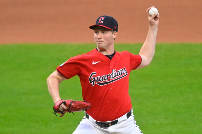 Jul 24, 2024; Cleveland, Ohio, USA; Cleveland Guardians relief pitcher Tim Herrin (29) delivers a pitch in the seventh inning against the Detroit Tigers at Progressive Field. Mandatory Credit: David Richard-USA TODAY Sports