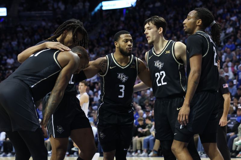 Feb 13, 2024; Provo, Utah, USA; The Central Florida Knights huddle after a foul against the Brigham Young Cougars during the second half at Marriott Center. Mandatory Credit: Rob Gray-USA TODAY Sports