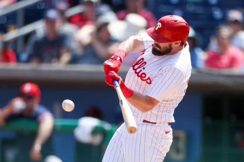 Mar 14, 2024; Clearwater, Florida, USA;  Philadelphia Phillies left fielder Davis Dahl (35) doubles against the Boston Red Sox in the fourth inning at BayCare Ballpark. Mandatory Credit: Nathan Ray Seebeck-USA TODAY Sports