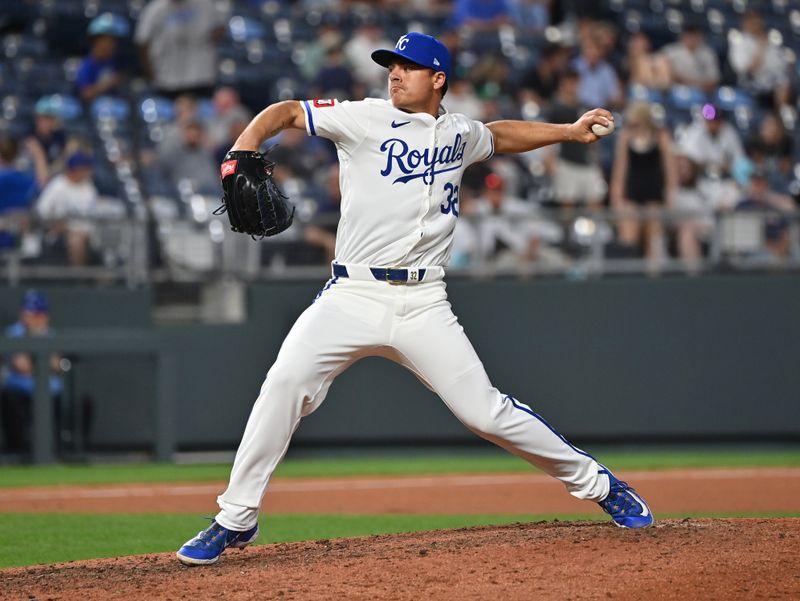 Jun 11, 2024; Kansas City, Missouri, USA; Kansas City Royals first baseman Nick Pratto (32) delivers a pitch in the ninth inning against the New York Yankees at Kauffman Stadium. Mandatory Credit: Peter Aiken-USA TODAY Sports