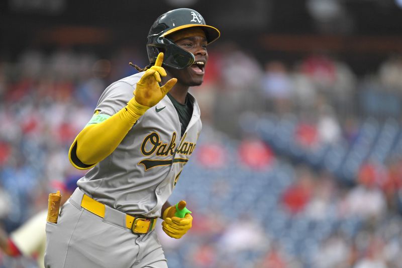 Jul 14, 2024; Philadelphia, Pennsylvania, USA; Oakland Athletics outfielder Lawrence Butler (4) celebrates his third home run of the game against the Philadelphia Phillies during the seventh inning at Citizens Bank Park. Mandatory Credit: Eric Hartline-USA TODAY Sports