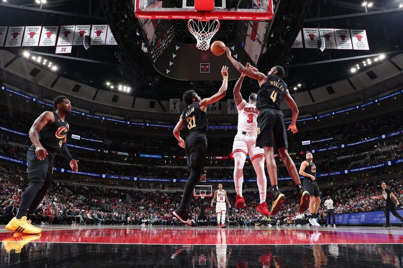 CHICAGO, IL - FEBRUARY 28: Evan Mobley #4 of the Cleveland Cavaliers grabs a rebound during the game against the Chicago Bulls on February 28, 2024 at United Center in Chicago, Illinois. NOTE TO USER: User expressly acknowledges and agrees that, by downloading and or using this photograph, User is consenting to the terms and conditions of the Getty Images License Agreement. Mandatory Copyright Notice: Copyright 2024 NBAE (Photo by Jeff Haynes/NBAE via Getty Images)