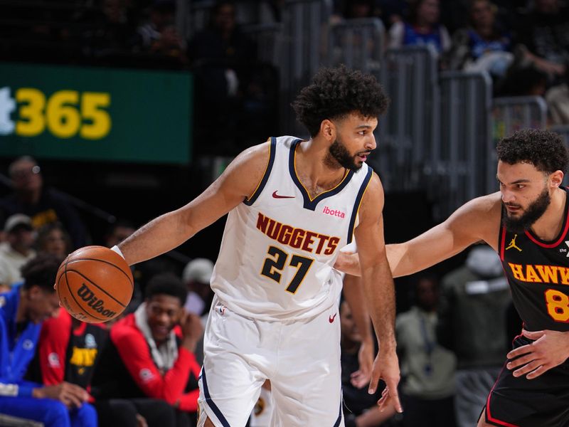 DENVER, CO - JANUARY 1: Jamal Murray #27 of the Denver Nuggets dribbles the ball during the game against the Atlanta Hawks on January 1, 2025 at Ball Arena in Denver, Colorado. NOTE TO USER: User expressly acknowledges and agrees that, by downloading and/or using this Photograph, user is consenting to the terms and conditions of the Getty Images License Agreement. Mandatory Copyright Notice: Copyright 2025 NBAE (Photo by Garrett Ellwood/NBAE via Getty Images)