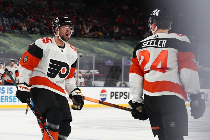 Feb 17, 2024; East Rutherford, New Jersey, USA; Philadelphia Flyers defenseman Nick Seeler (24) celebrates his goal against the Philadelphia Flyers during the third period in a Stadium Series ice hockey game at MetLife Stadium. Mandatory Credit: Ed Mulholland-USA TODAY Sports