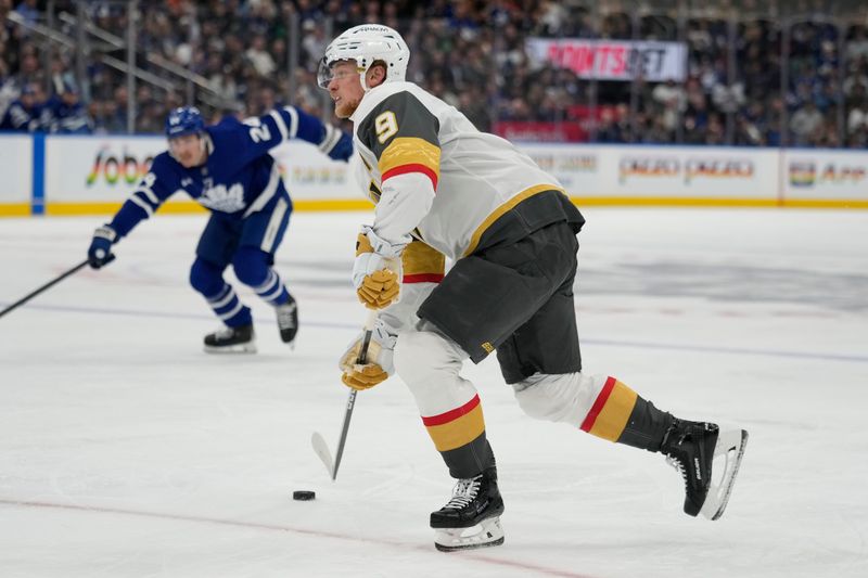 Nov 20, 2024; Toronto, Ontario, CAN; Vegas Golden Knights forward Jack Eichel (9) shoots against the Toronto Maple Leafs during the second period at Scotiabank Arena. Mandatory Credit: John E. Sokolowski-Imagn Images