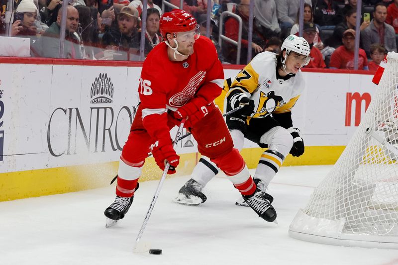 Oct 18, 2023; Detroit, Michigan, USA; Detroit Red Wings right wing Christian Fischer (36) skates with the puck in the second period against the Pittsburgh Penguins at Little Caesars Arena. Mandatory Credit: Rick Osentoski-USA TODAY Sports