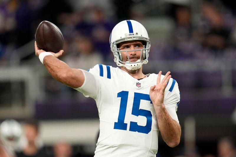 Indianapolis Colts quarterback Joe Flacco warms up before an NFL football game against the Minnesota Vikings, Sunday, Nov. 3, 2024, in Minneapolis. (AP Photo/Abbie Parr)