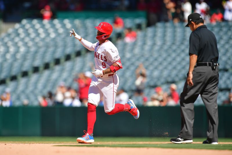 Jun 27, 2024; Anaheim, California, USA; Los Angeles Angels shortstop Zach Neto (9) runs the bases after hitting a three run home run against the Detroit Tigers during the ninth inning at Angel Stadium. Mandatory Credit: Gary A. Vasquez-USA TODAY Sports