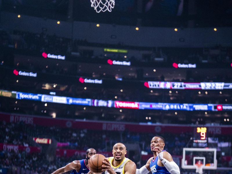 LOS ANGELES, CA - APRIL 12: Talen Horton-Tucker #5 of the Utah Jazz drives to the basket during the game against the LA Clippers on April 12, 2024 at Crypto.Com Arena in Los Angeles, California. NOTE TO USER: User expressly acknowledges and agrees that, by downloading and/or using this Photograph, user is consenting to the terms and conditions of the Getty Images License Agreement. Mandatory Copyright Notice: Copyright 2024 NBAE (Photo by Tyler Ross/NBAE via Getty Images)