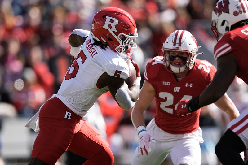Oct 7, 2023; Madison, Wisconsin, USA;  Rutgers Scarlet Knights running back Kyle Monangai (5) carries the football during the first quarter against the Wisconsin Badgers at Camp Randall Stadium. Mandatory Credit: Jeff Hanisch-USA TODAY Sports
