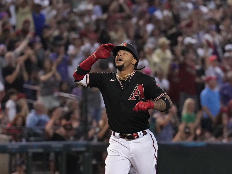 Aug 26, 2023; Phoenix, Arizona, USA; Arizona Diamondbacks second baseman Ketel Marte (4) runs the bases after hitting a three run home run against the Cincinnati Reds during the fifth inning at Chase Field. Mandatory Credit: Joe Camporeale-USA TODAY Sports