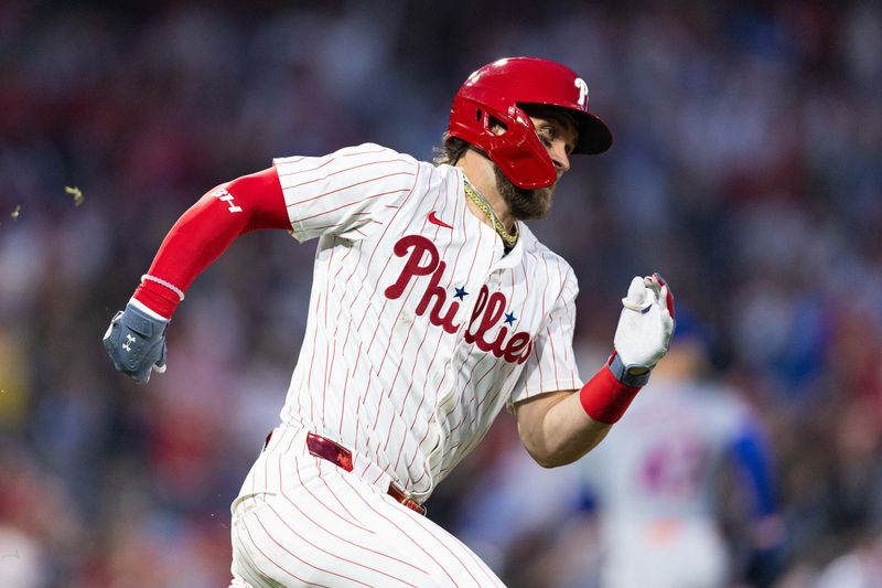 May 15, 2024; Philadelphia, Pennsylvania, USA; Philadelphia Phillies first base Bryce Harper (3) runs the bases after hitting a two RBI double New York Mets during the fifth inning at Citizens Bank Park. Mandatory Credit: Bill Streicher-USA TODAY Sports