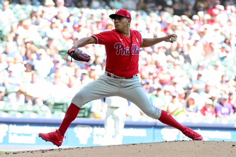 Sep 3, 2023; Milwaukee, Wisconsin, USA; Philadelphia Phillies pitcher Ranger Suarez (55) pitches against the Milwaukee Brewers in the first inning at American Family Field. Mandatory Credit: Benny Sieu-USA TODAY Sports