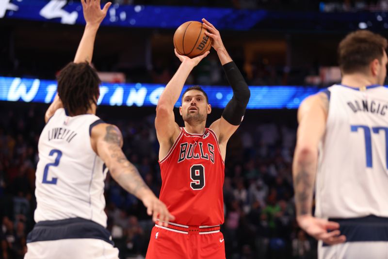 DALLAS, TEXAS - NOVEMBER 01: Nikola Vucevic #9 of the Chicago Bulls shoots the ball in the second half against the Dallas Mavericks at American Airlines Center on November 01, 2023 in Dallas, Texas. NOTE TO USER: User expressly acknowledges and agrees that, by downloading and or using this photograph, User is consenting to the terms and conditions of the Getty Images License Agreement. (Photo by Tim Heitman/Getty Images)