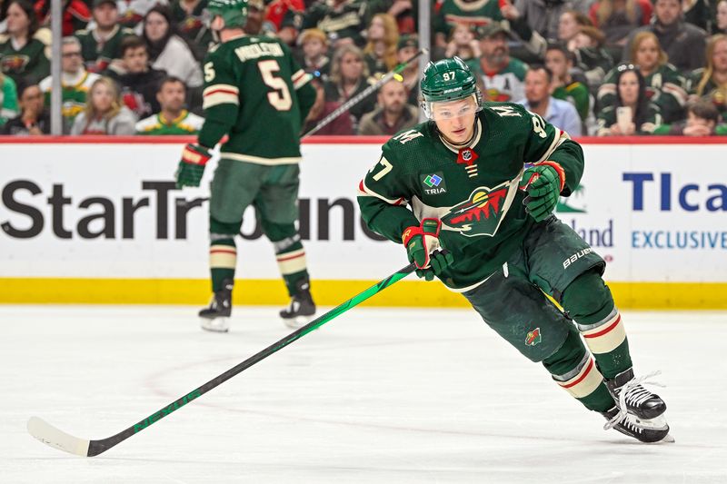 Apr 11, 2023; Saint Paul, Minnesota, USA;  Minnesota Wild forward Kirill Kaprizov (97) turns up ice against the Minnesota Wild during the third period at at Xcel Energy Center. Mandatory Credit: Nick Wosika-USA TODAY Sports