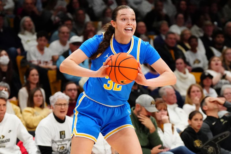 Jan 19, 2024; Boulder, Colorado, USA; UCLA Bruins forward Angela Dugalic (32) prepares to pass in the first quarter against the Colorado Buffaloes at the CU Events Center. Mandatory Credit: Ron Chenoy-USA TODAY Sports
\v11