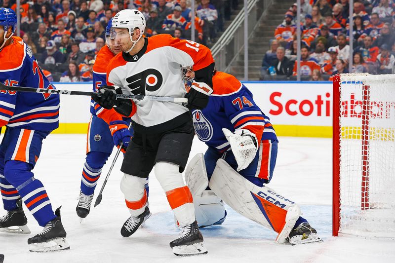 Jan 2, 2024; Edmonton, Alberta, CAN; Philadelphia Flyers forward Garnet Hathaway (19) looks to deflect a shot on Edmonton Oilers goaltender Stuart Skinner (74) during the second period at Rogers Place. Mandatory Credit: Perry Nelson-USA TODAY Sports