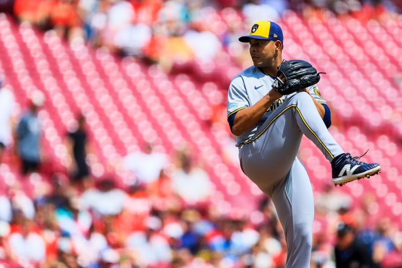 Aug 17, 2025; Cincinnati, Ohio, USA; Milwaukee Brewers starting pitcher Jose Quintana (62) pitches against the Cincinnati Reds in the first inning at Great American Ball Park. Mandatory Credit: Katie Stratman-Imagn Images