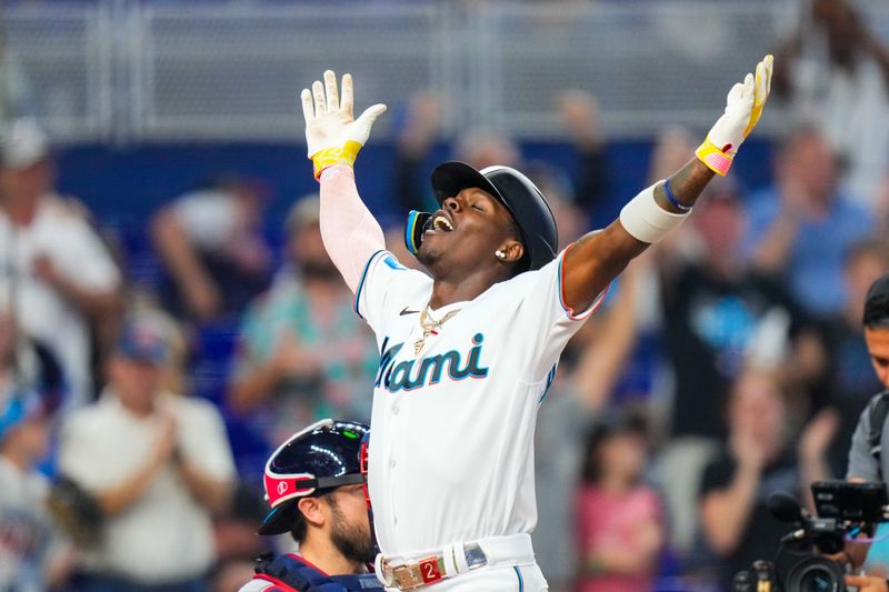 Sep 17, 2023; Miami, Florida, USA; Miami Marlins center fielder Jazz Chisholm Jr. (2) celebrates after hitting a grand slam against the Atlanta Braves during the third inning at loanDepot Park. Mandatory Credit: Rich Storry-USA TODAY Sports