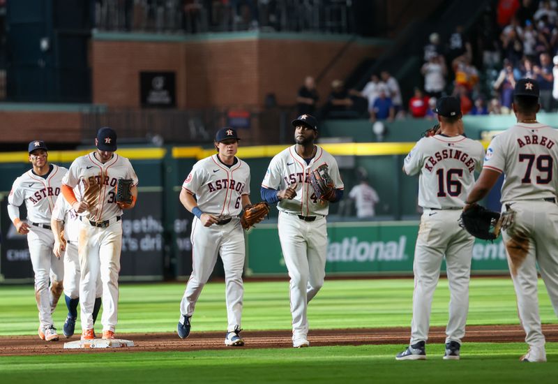 Apr 13, 2024; Houston, Texas, USA; Houston Astros left fielder Yordan Alvarez (44) and teammates celebrate defeating the Texas Rangers at Minute Maid Park. Mandatory Credit: Thomas Shea-USA TODAY Sports