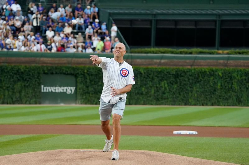 Aug 20, 2025; Chicago, Illinois, USA; Chicago Blackhawks new coach Jeff Blashill throws out a ceremonial first pitch before the game between the Chicago Cubs and the Milwaukee Brewers at Wrigley Field. Mandatory Credit: David Banks-Imagn Images
