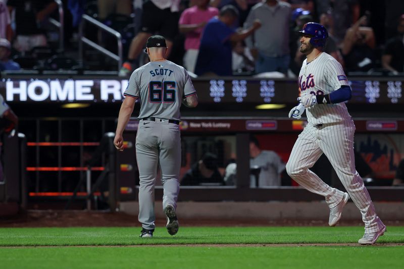 Jun 13, 2024; New York City, New York, USA; New York Mets designated hitter J.D. Martinez (28) rounds the bases after hitting a ninth inning walkoff two run home run against Miami Marlins relief pitcher Tanner Scott (66) at Citi Field. Mandatory Credit: Brad Penner-USA TODAY Sports