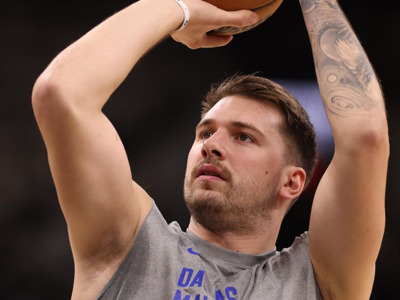 SAN ANTONIO, TEXAS - OCTOBER 25: Luka Doncic #77 of the Dallas Mavericks warms up prior to a game against the San Antonio Spurs at Frost Bank Center on October 25, 2023 in San Antonio, Texas. NOTE TO USER: User expressly acknowledges and agrees that, by downloading and/or using this Photograph, user is consenting to the terms and conditions of the Getty Images License Agreement. (Photo by Christian Petersen/Getty Images)