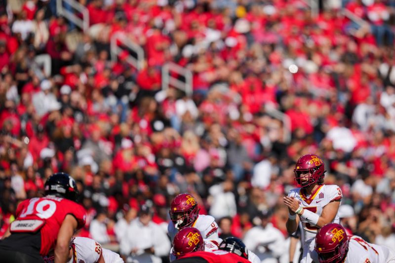 Oct 14, 2023; Cincinnati, Ohio, USA;  Iowa State Cyclones quarterback Rocco Becht (3) sets prior to a play at the line of scrimmage against the Cincinnati Bearcats in the first half at Nippert Stadium. Mandatory Credit: Aaron Doster-USA TODAY Sports