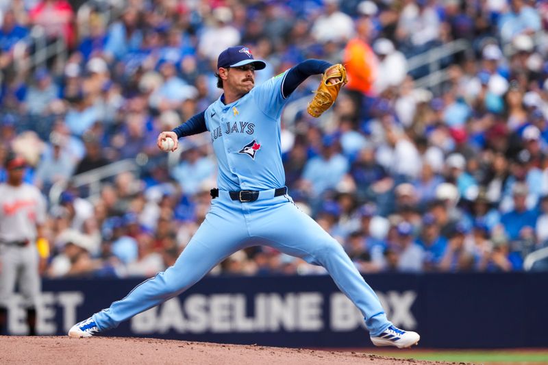 Sep 14, 2025; Toronto, Ontario, CAN; Toronto Blue Jays pitcher Shane Bieber (57) delivers a pitch against the Baltimore Orioles during the first inning at Rogers Centre. Mandatory Credit: Kevin Sousa-Imagn Images