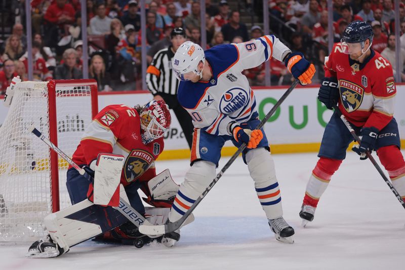Jun 9, 2025; Sunrise, Florida, USA; Florida Panthers goaltender Sergei Bobrovsky (72) defends against Edmonton Oilers right wing Corey Perry (90) during the first period in game three of the 2025 Stanley Cup Final at Amerant Bank Arena. Mandatory Credit: Sam Navarro-Imagn Images