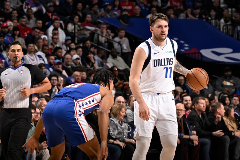 PHILADELPHIA, PA - FEBRUARY 5: Luka Doncic #77 of the Dallas Mavericks /r/ against the Philadelphia 76ers on February 5, 2024 at the Wells Fargo Center in Philadelphia, Pennsylvania NOTE TO USER: User expressly acknowledges and agrees that, by downloading and/or using this Photograph, user is consenting to the terms and conditions of the Getty Images License Agreement. Mandatory Copyright Notice: Copyright 2024 NBAE (Photo by David Dow/NBAE via Getty Images)