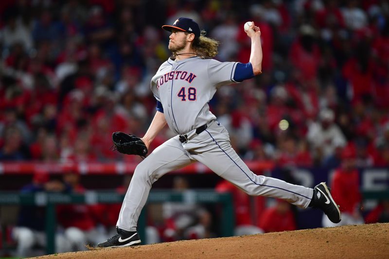 Sep 26, 2025; Anaheim, California, USA; Houston Astros pitcher Steven Okert (48) throws against the Los Angeles Angels during the fifth inning at Angel Stadium. Mandatory Credit: Gary A. Vasquez-Imagn Images