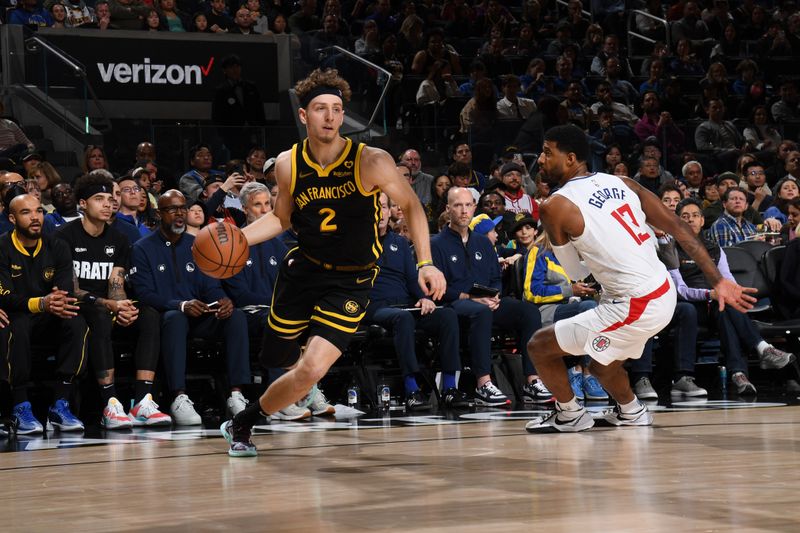 SAN FRANCISCO, CA - FEBRUARY 14: Brandin Podziemski #2 of the Golden State Warriors dribbles the ball during the game against the LA Clippers on FEBRUARY 14, 2024 at Chase Center in San Francisco, California. NOTE TO USER: User expressly acknowledges and agrees that, by downloading and or using this photograph, user is consenting to the terms and conditions of Getty Images License Agreement. Mandatory Copyright Notice: Copyright 2024 NBAE (Photo by Noah Graham/NBAE via Getty Images)