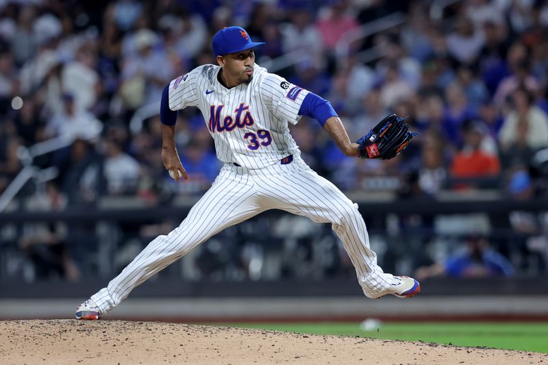 Jul 30, 2024; New York City, New York, USA; New York Mets relief pitcher Edwin Diaz (39) pitches against the Minnesota Twins during the eighth inning at Citi Field. Mandatory Credit: Brad Penner-USA TODAY Sports