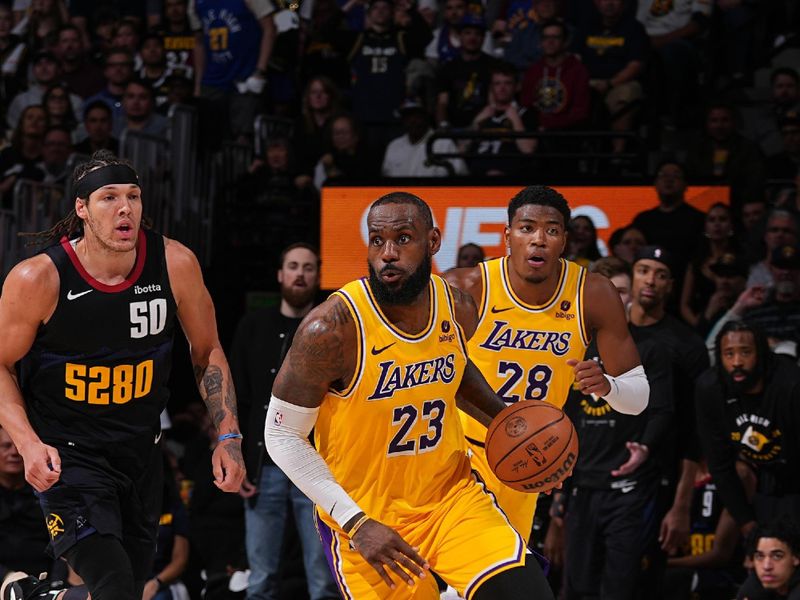 DENVER, CO - APRIL 22: LeBron James #23 of the Los Angeles Lakers handles the ball during the game against the Denver Nuggets on April 22, 2024 at the Ball Arena in Denver, Colorado. NOTE TO USER: User expressly acknowledges and agrees that, by downloading and/or using this Photograph, user is consenting to the terms and conditions of the Getty Images License Agreement. Mandatory Copyright Notice: Copyright 2024 NBAE (Photo by Bart Young/NBAE via Getty Images)