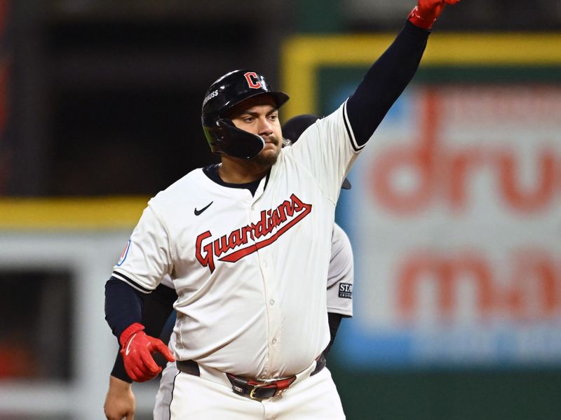 Oct 18, 2024; Cleveland, Ohio, USA; Cleveland Guardians first baseman Josh Naylor (22) celebrates at second base after hitting a two RBI double in the seventh inning against the New York Yankees during game four of the ALCS for the 2024 MLB playoffs at Progressive Field. Mandatory Credit: Ken Blaze-Imagn Images