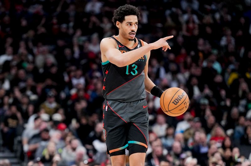 TORONTO, ON - APRIL 7: Jordan Poole #13 of the Washington Wizards dribbles against the Toronto Raptors during the first half of their basketball game at the Scotiabank Arena on April 7, 2024 in Toronto, Ontario, Canada. NOTE TO USER: User expressly acknowledges and agrees that, by downloading and/or using this Photograph, user is consenting to the terms and conditions of the Getty Images License Agreement. (Photo by Mark Blinch/Getty Images)