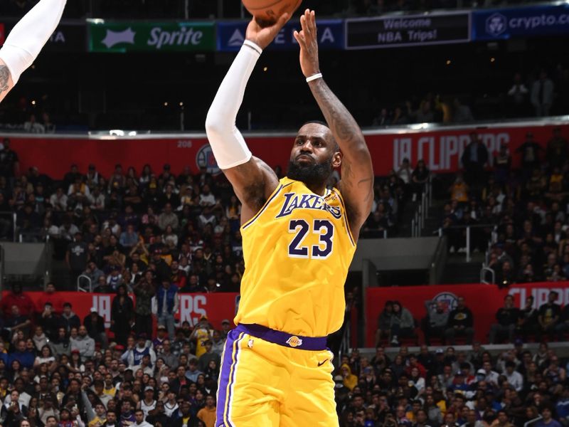 LOS ANGELES, CA - FEBRUARY 28: LeBron James #23 of the Los Angeles Lakers shoots the ball during the game against the LA Clippers on February 28, 2024 at Crypto.Com Arena in Los Angeles, California. NOTE TO USER: User expressly acknowledges and agrees that, by downloading and/or using this Photograph, user is consenting to the terms and conditions of the Getty Images License Agreement. Mandatory Copyright Notice: Copyright 2024 NBAE (Photo by Andrew D. Bernstein/NBAE via Getty Images)