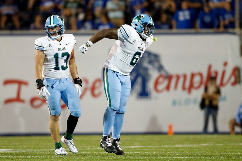 Oct 13, 2023; Memphis, Tennessee, USA; Tulane Green Wave defensive linemen Darius Hodges (6) reacts after a sack during the second half against the Memphis Tigers at Simmons Bank Liberty Stadium. Mandatory Credit: Petre Thomas-USA TODAY Sports