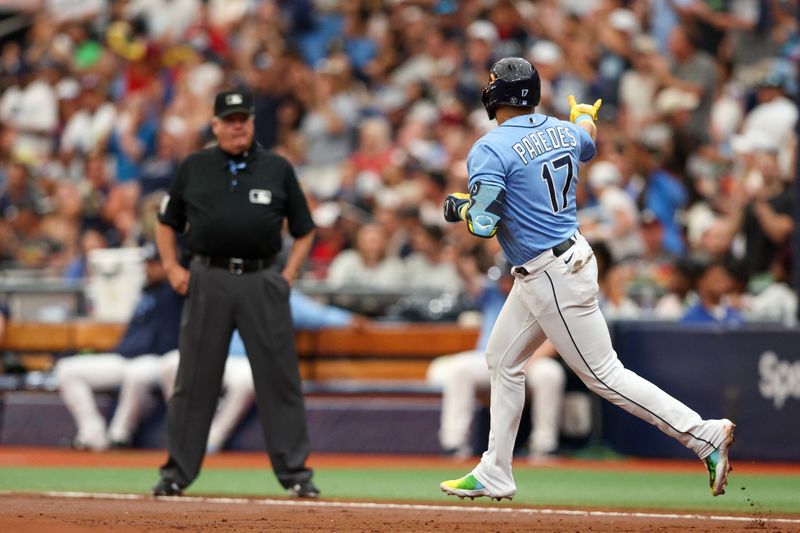 Jul 9, 2023; St. Petersburg, Florida, USA;  Tampa Bay Rays third baseman Isaac Paredes (17) rounds the bases after hitting a two-run home run against the Atlanta Braves in the first inning at Tropicana Field. Mandatory Credit: Nathan Ray Seebeck-USA TODAY Sports