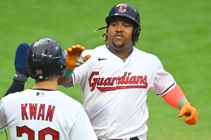 Jun 8, 2023; Cleveland, Ohio, USA; Cleveland Guardians third baseman Jose Ramirez (11) celebrates his two-run home run with left fielder Steven Kwan (38) in the third inning against the Boston Red Sox at Progressive Field. Mandatory Credit: David Richard-USA TODAY Sports