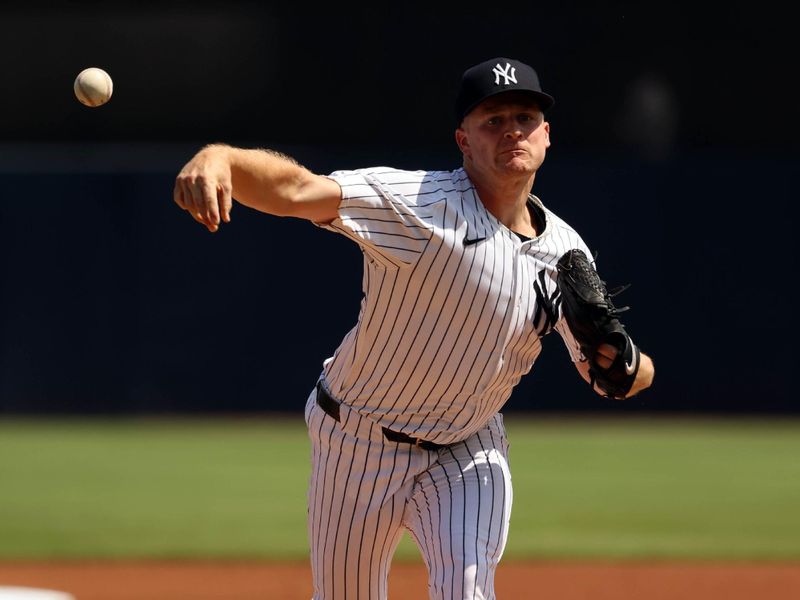 Mar 10, 2024; Tampa, Florida, USA; New York Yankees starting pitcher Clarke Schmidt (36) throws a pitch during the first inning against the Atlanta Braves during the first inning at George M. Steinbrenner Field. Mandatory Credit: Kim Klement Neitzel-USA TODAY Sports