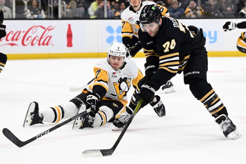 Mar 9, 2024; Boston, Massachusetts, USA; Boston Bruins left wing Jake DeBrusk (74) skates against Pittsburgh Penguins defenseman John Ludvig (7) during the first period at the TD Garden. Mandatory Credit: Brian Fluharty-USA TODAY Sports