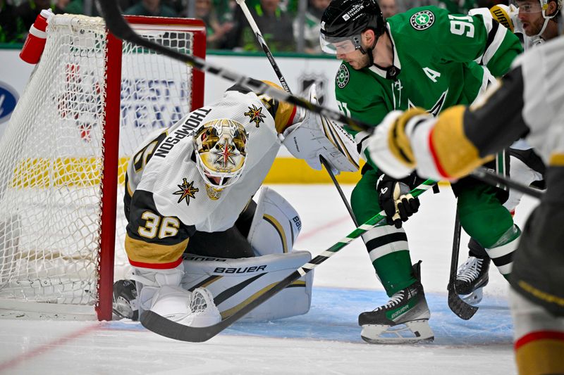 Apr 22, 2024; Dallas, Texas, USA; Vegas Golden Knights goaltender Logan Thompson (36) stops a shot by Dallas Stars center Tyler Seguin (91) during the second period in game one of the first round of the 2024 Stanley Cup Playoffs at the American Airlines Center. Mandatory Credit: Jerome Miron-USA TODAY Sports
